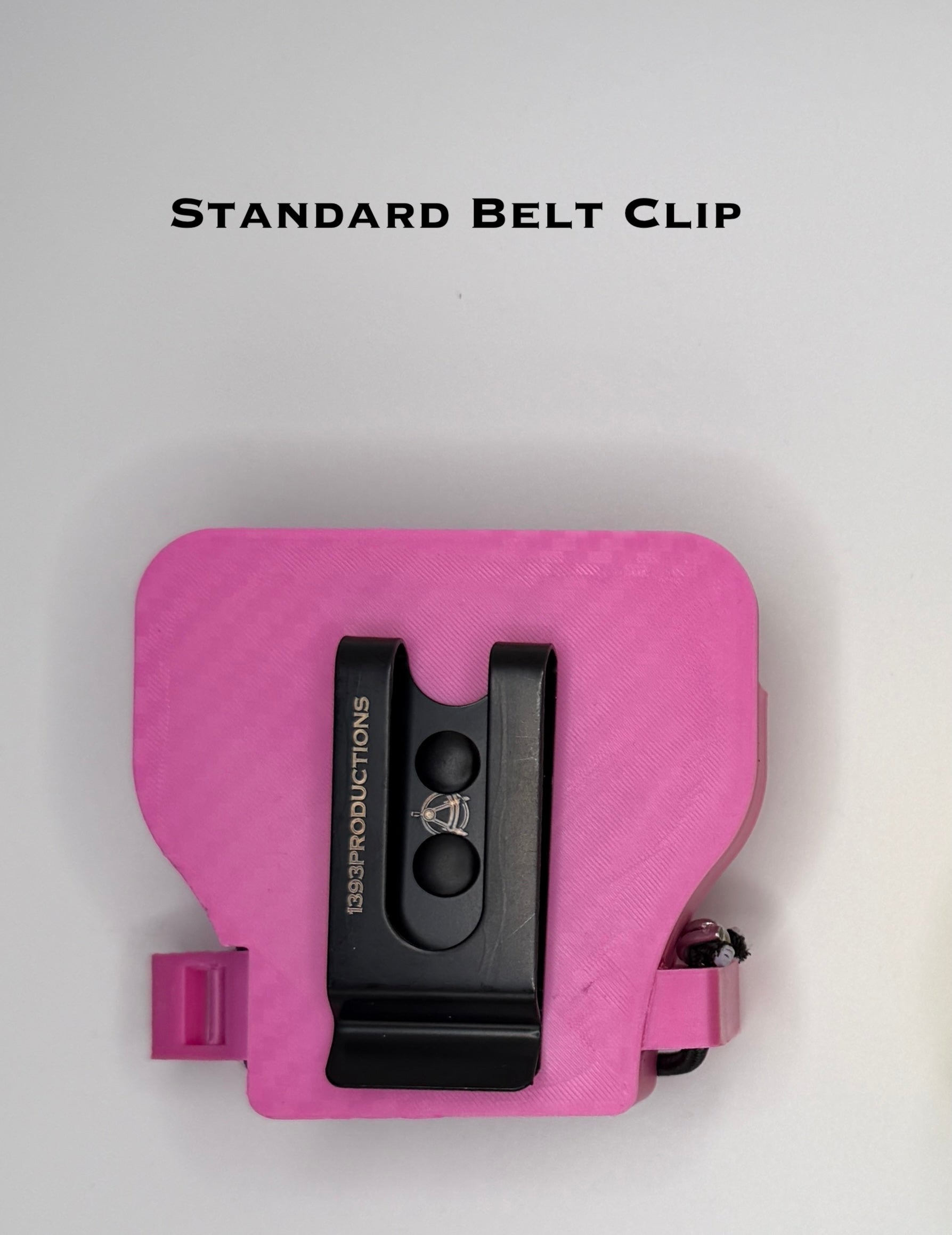Pink belt clip with black clip on a white background
