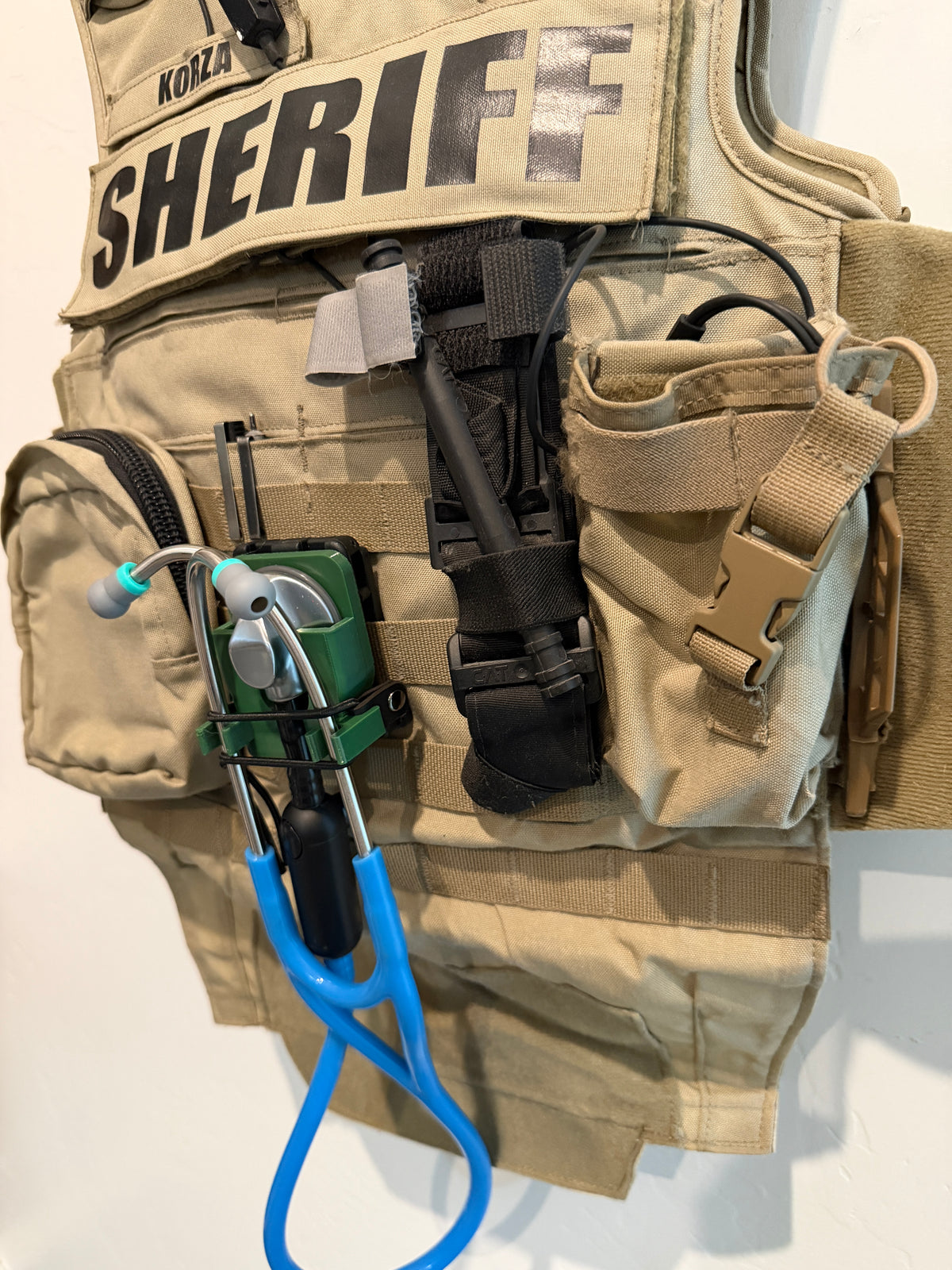 Littmann Cardiology 4 stethoscope in a custom holster with molle clip on a tac vest