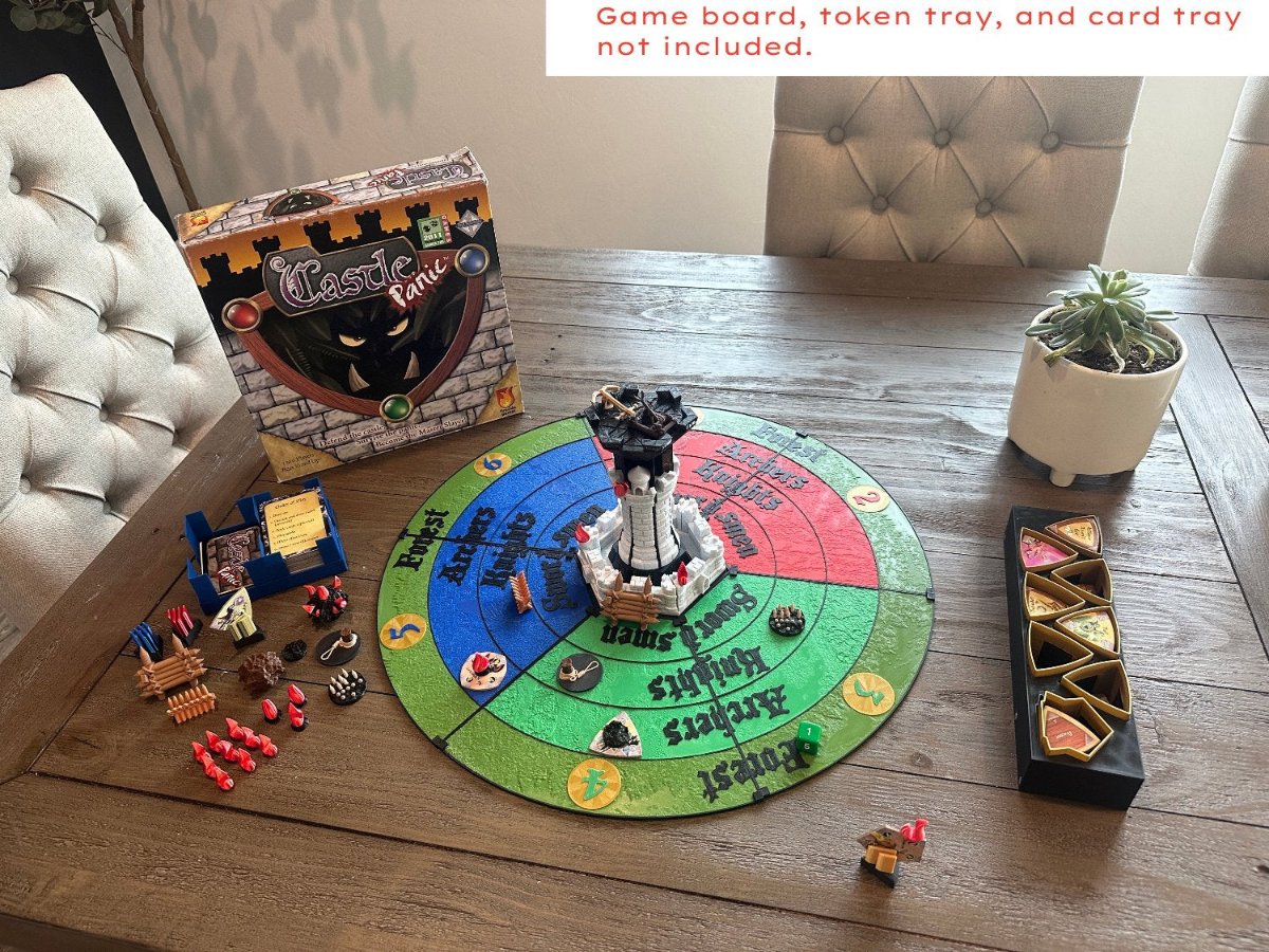 Castle Panic game set up on a dining table with 3D printed keep, towers and walls on a round replacement board