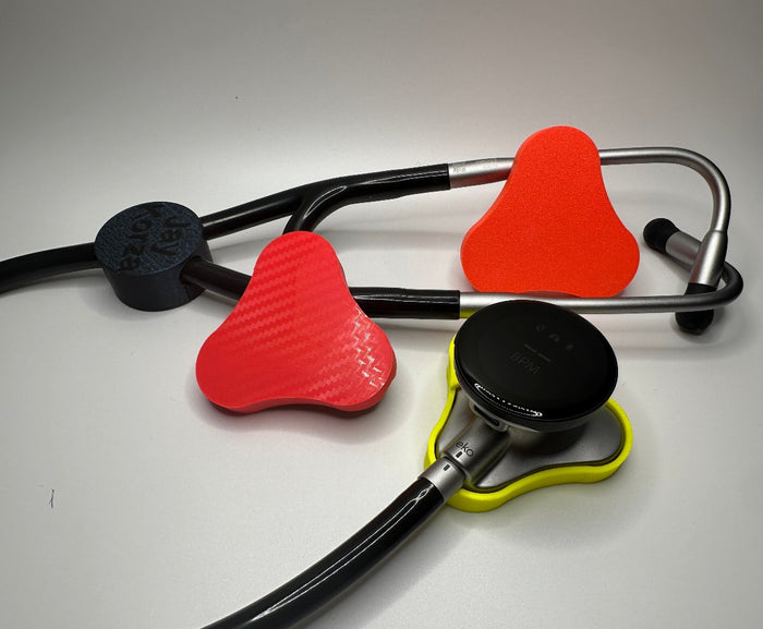 Red and yellow closed protection covers on Littmann Eko 500 stethoscopes