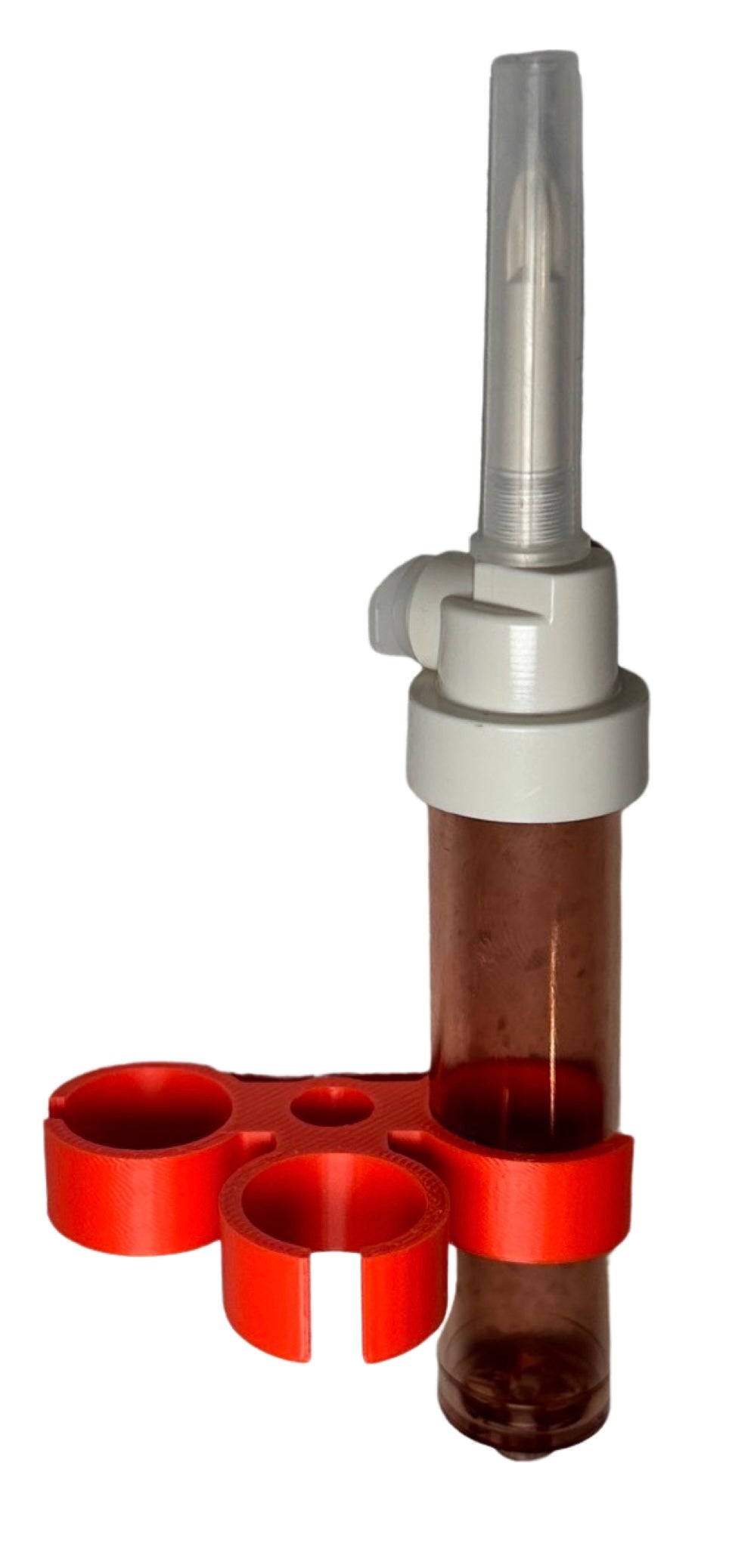 Red three-slot drip chamber holder with an IV drip chamber in one slot